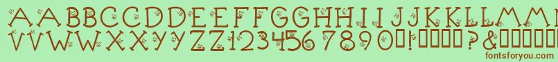 KrLittleBuzz Font – Brown Fonts on Green Background