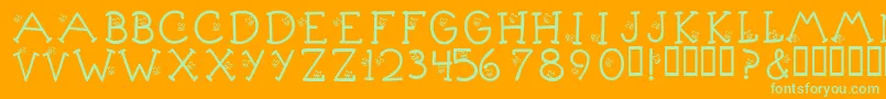 KrLittleBuzz-fontti – vihreät fontit oranssilla taustalla
