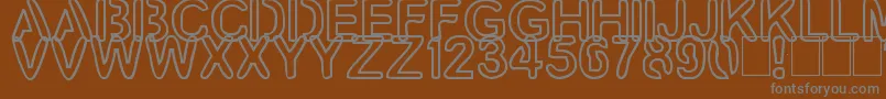 Czcionka Artline2 – szare czcionki na brązowym tle