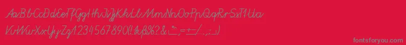 フォントGruenewaldVa3k – 赤い背景に灰色の文字