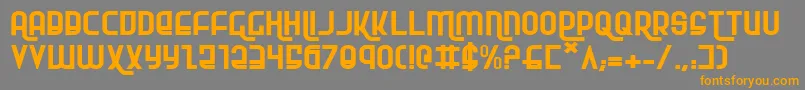 フォントRokikierExpanded – オレンジの文字は灰色の背景にあります。