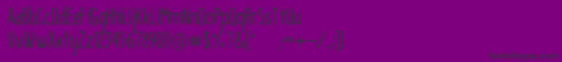 フォントKraftstoffRegular – 紫の背景に黒い文字