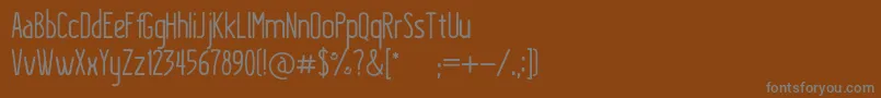 Шрифт KraftstoffRegular – серые шрифты на коричневом фоне