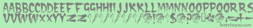 フォントCramps ffy – 緑の背景に灰色の文字