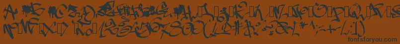 Pwgraffiti Font – Black Fonts on Brown Background