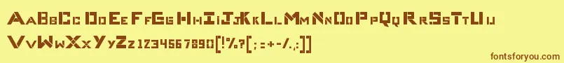 フォントCompliceBold – 茶色の文字が黄色の背景にあります。
