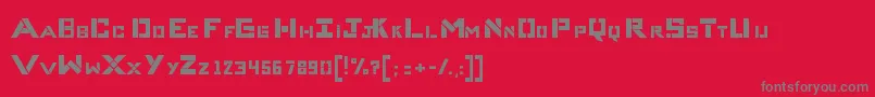 CompliceBold-fontti – harmaat kirjasimet punaisella taustalla
