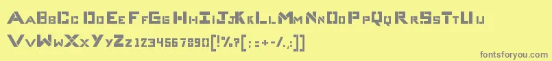 フォントCompliceBold – 黄色の背景に灰色の文字