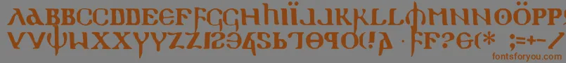 フォントHolyEmpire – 茶色の文字が灰色の背景にあります。