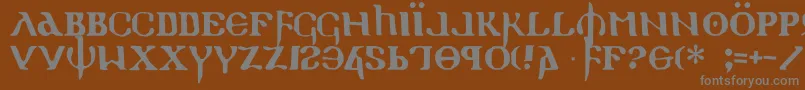 フォントHolyEmpire – 茶色の背景に灰色の文字