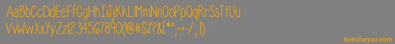 フォントIsabelleLayneBold – オレンジの文字は灰色の背景にあります。