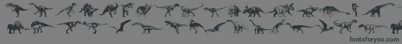 フォントDinosaurs – 黒い文字の灰色の背景