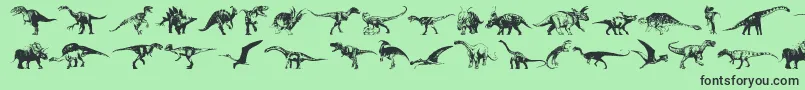 Czcionka Dinosaurs – czarne czcionki na zielonym tle