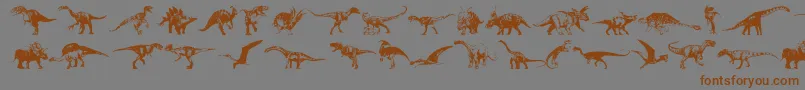 Fonte Dinosaurs – fontes marrons em um fundo cinza