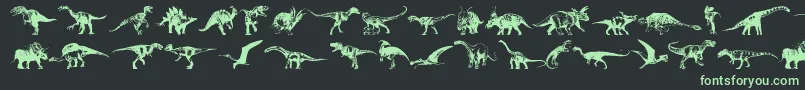 フォントDinosaurs – 黒い背景に緑の文字