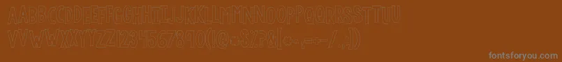 Kglethergooutline Font – Gray Fonts on Brown Background