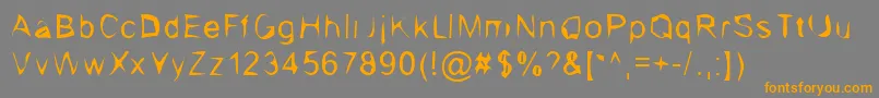 フォントChocolateBandit – オレンジの文字は灰色の背景にあります。