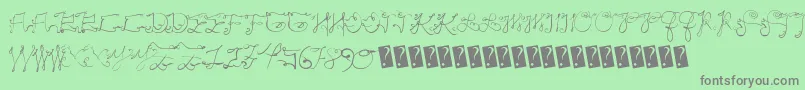 フォントScriptycaps – 緑の背景に灰色の文字