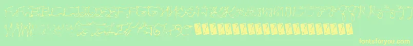 Fonte Scriptycaps – fontes amarelas em um fundo verde