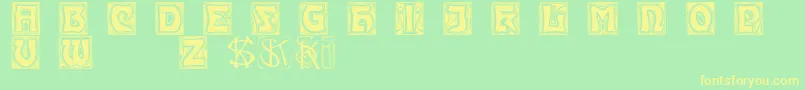 Kinigsteinkaps Font – Yellow Fonts on Green Background