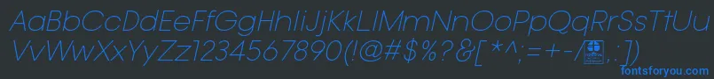 Шрифт TypoGotikaLightItalicDemo – синие шрифты на чёрном фоне