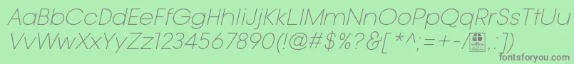 Fonte TypoGotikaLightItalicDemo – fontes cinzas em um fundo verde