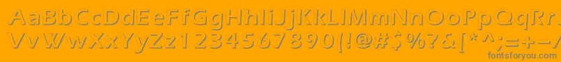 Everestshadowc-fontti – harmaat kirjasimet oranssilla taustalla