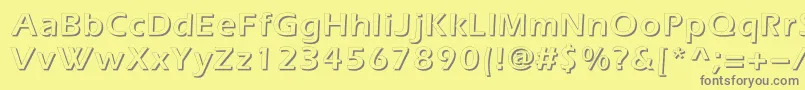 フォントEverestshadowc – 黄色の背景に灰色の文字