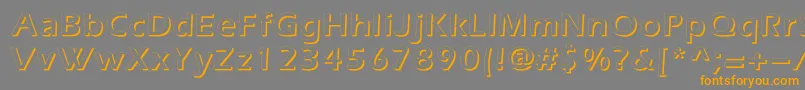 フォントEverestshadowc – オレンジの文字は灰色の背景にあります。