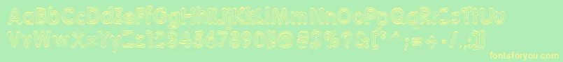 TeazerNormal Font – Yellow Fonts on Green Background