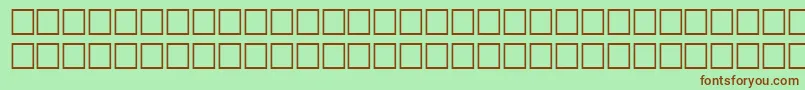 Fonte NantunRegular – fontes marrons em um fundo verde
