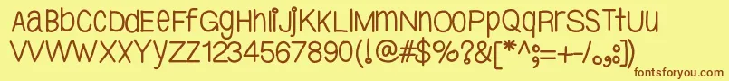 Ybtallpretty-Schriftart – Braune Schriften auf gelbem Hintergrund