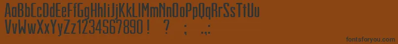 フォントGrandFinale – 黒い文字が茶色の背景にあります