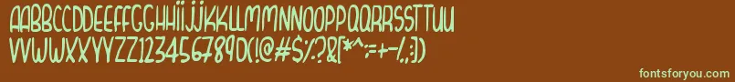 CurvyThins-fontti – vihreät fontit ruskealla taustalla