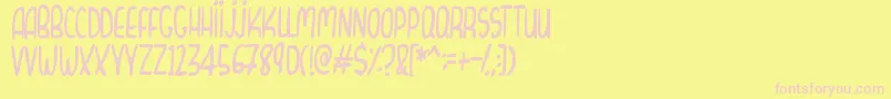 CurvyThins-fontti – vaaleanpunaiset fontit keltaisella taustalla