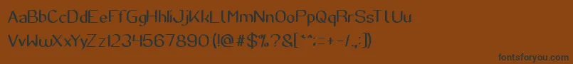 SuperCreative Font – Black Fonts on Brown Background