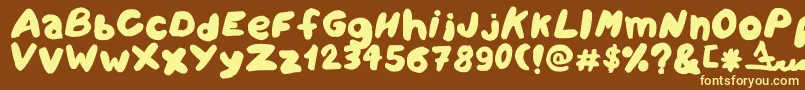 Amareleta-fontti – keltaiset fontit ruskealla taustalla