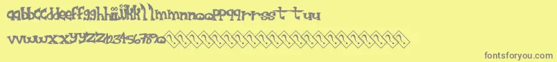 Furrysack-Schriftart – Graue Schriften auf gelbem Hintergrund