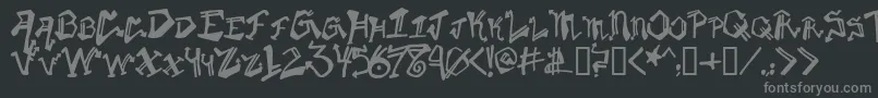 Krylongothic-fontti – harmaat kirjasimet mustalla taustalla