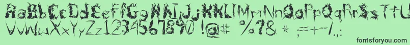 BeneathTheRemains Font – Black Fonts on Green Background