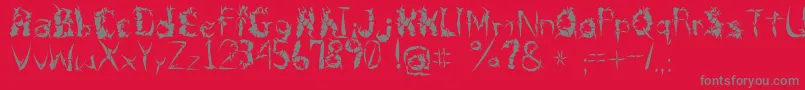 フォントBeneathTheRemains – 赤い背景に灰色の文字
