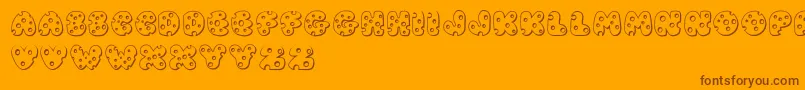 JiSwissCheese Font – Brown Fonts on Orange Background