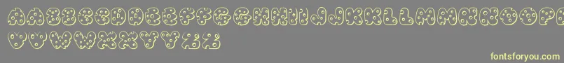 JiSwissCheese Font – Yellow Fonts on Gray Background