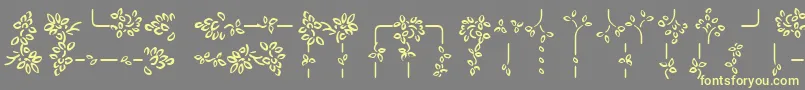 AuriolVignetteSylvie Font – Yellow Fonts on Gray Background