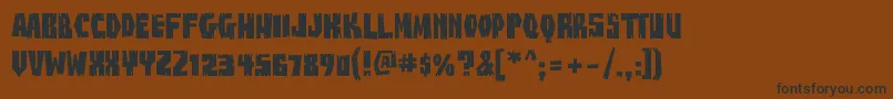 BuzzsawChippedAoe Font – Black Fonts on Brown Background