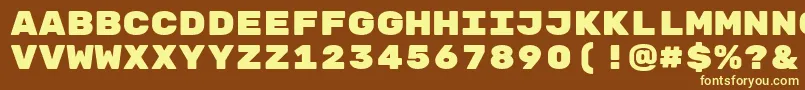 RubikmonooneRegular Font – Yellow Fonts on Brown Background