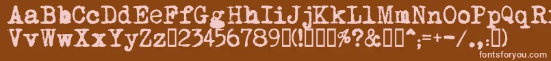 MomВґstypewriter Font – Pink Fonts on Brown Background