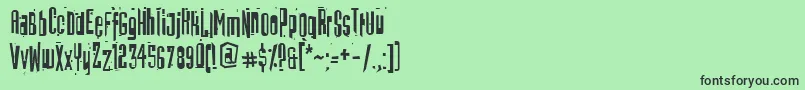 Batmos Font – Black Fonts on Green Background