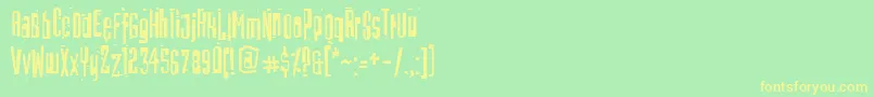 Batmos Font – Yellow Fonts on Green Background