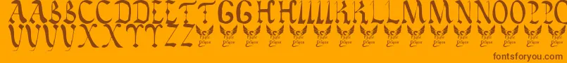 VaticanRoughLetters8thC-fontti – ruskeat fontit oranssilla taustalla